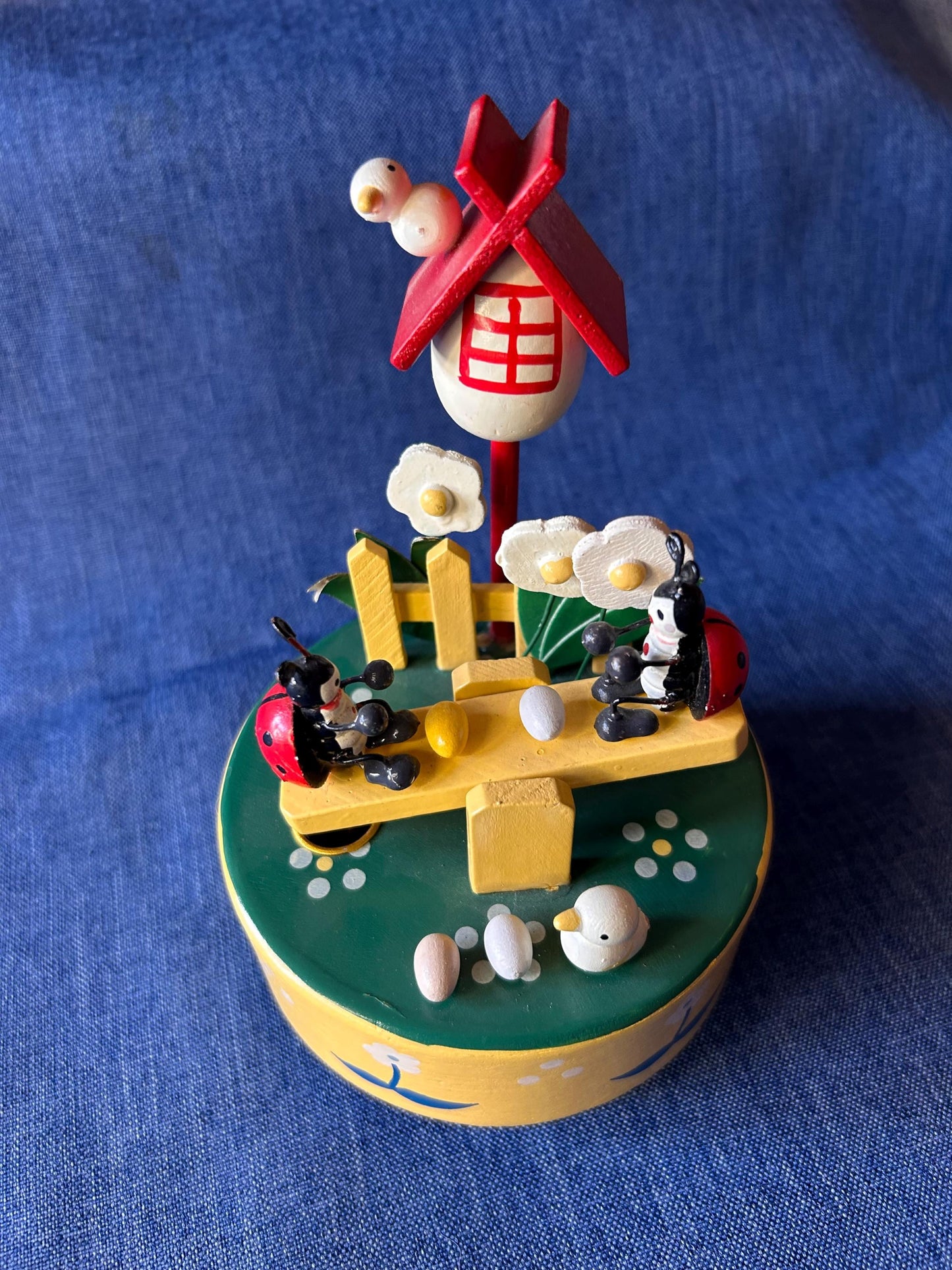 Charming vintage music box with ladybugs